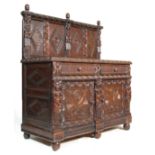 A 19TH CENTURY CARVED OAK SIDEBOARD - DRESSER