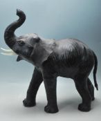 VINTAGE BLACK LEATHER ELEPHANT FIGURINE