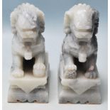 PAIR OF 20TH CENTURY ANTIQUE STYLE CHINESE CARVED TEMPLE FU LION DOGS