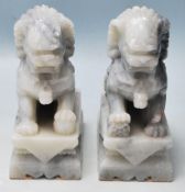 PAIR OF 20TH CENTURY ANTIQUE STYLE CHINESE CARVED TEMPLE FU LION DOGS