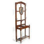 20TH CENTURY OAK HALL STAND WITH BEVELLED MIRROR AND STICK STAND