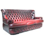 THOMAS LLOYD OXBLOOD RED LEATHER SOFA SETTEE