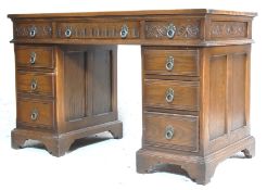 ANTIQUE STYLE OAK AND RED LEATHER TWIN PEDESTAL DESK