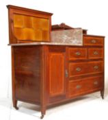 An Edwardian mahogany and marble top inlaid washstand - chest of drawers. Raised on square