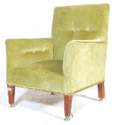 AN ANTIQUE STYLE GREEN VELVET UPHOLSTERY BUTTON BACK ARM CHAIR