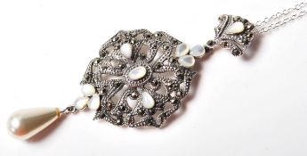 A SILVER RENAISSANCE STYLE PENDANT NECKLACE SET WITH MARCASITES, MOTHER OF PEARL.