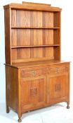 A LATE VICTORIAN 19TH CENTURY ARTS AND CRAFTS OAK DRESSER