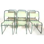 SIX MID 20TH CENTURY INDUSTRIAL METAL STACKING CHAIRS