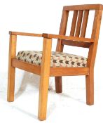 EARLY 20TH CENTURY OAK FIRESIDE ARMCHAIR