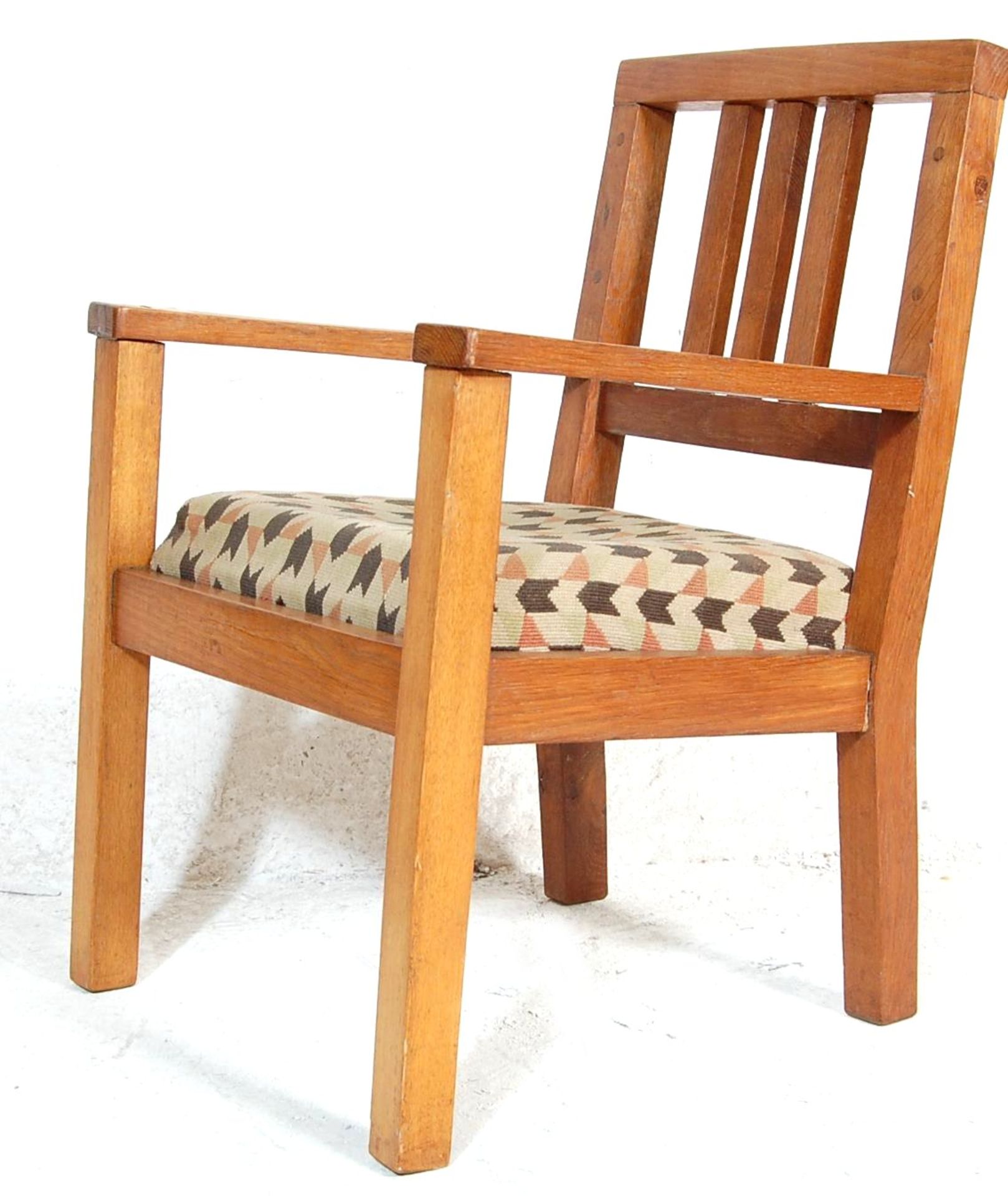 EARLY 20TH CENTURY OAK FIRESIDE ARMCHAIR