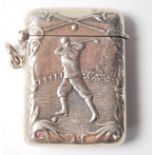 A STAMPED STERLING SILVER VESTA CASE WITH GOLF RELATED DECORATION.