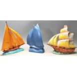 THRE 20TH CENTURY STUDIO ART POTTERY VASES IN A SHAPE OF BOATS AT SEA