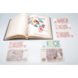 BRITISH BANK OF ENGLAND BANKS NOTES TOGETHER WITH A VINTAGE STAMP ALBUM