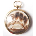 A GEORGIAN GOLD AND HAIR MOURNING LOCKET DATED 1827