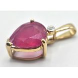 9CT GOLD AND PINK STONE PENDANT