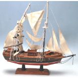 A SCRATCH BUILT MODEL SAILING BOAT / RACING SHIP OF BLUE NOSE