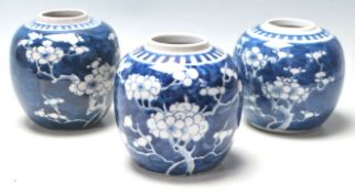 GROUP OF THREE CHINESE PRUNUS PATTERN GINGER JARS