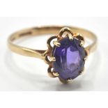 9CT GOLD AND PURPLE STONE RING