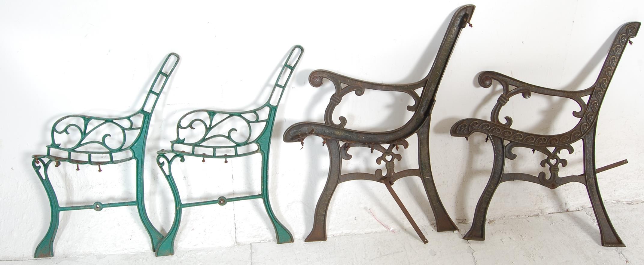 A PAIR OF ANTIQUE STYLE CAST METAL BENCH ENDS