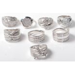 EIGHT LADIES SILVER AND WHITE STONE RINGS