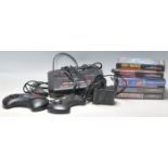 SEGAM MEGA DRIVE II 16-BIT VIDEO GAME WITH FOUR BOXED GAMES