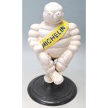 MOTORING INTEREST. A CAST IRON FIGURINE OF BIBENDUM MICHELIN MAN