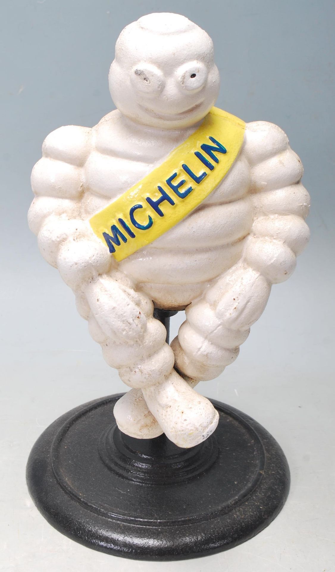 MOTORING INTEREST. A CAST IRON FIGURINE OF BIBENDUM MICHELIN MAN