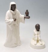 A PAIR OF MINTON FINE BONE CHINA PORCELAIN AND BRONZE FIGURINES - THE SHEIKH - SPELLBOUND