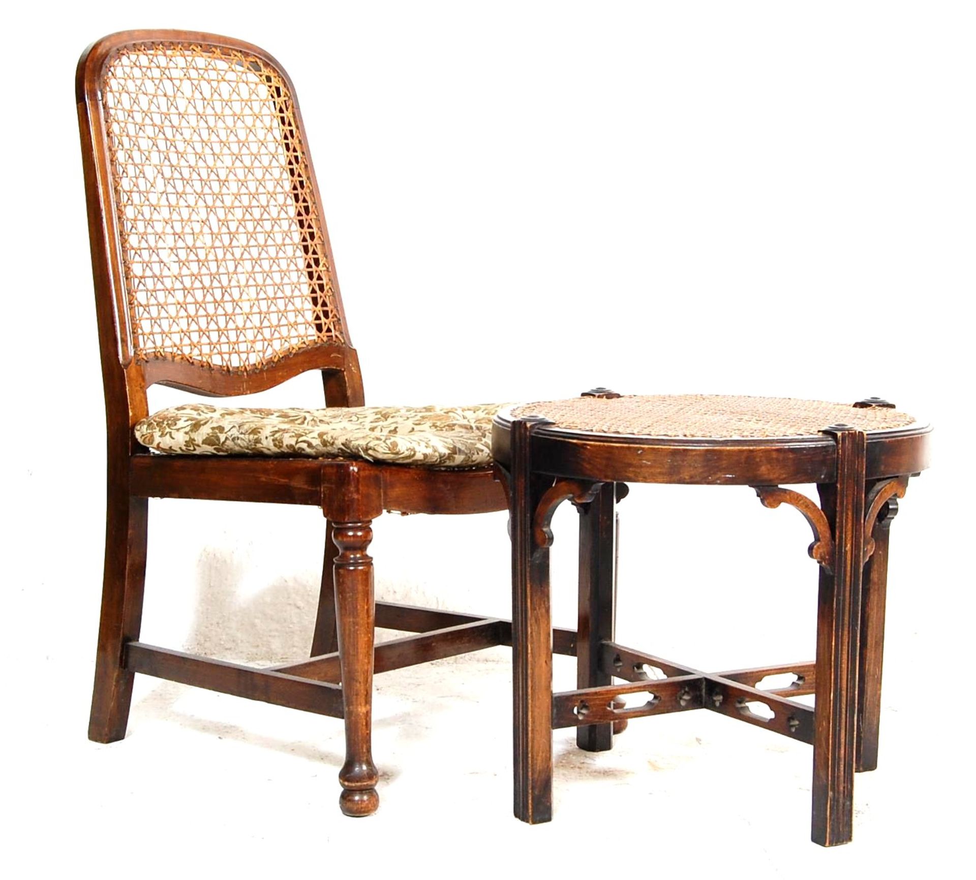 AN EARLY 20TH CENTURY ANTIQUE OAK FIRESIDE CHAIR AND FOOTSTOOL