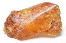 A SPECIMEN / SECTION OF YOUNG AMBER / COPAL HAVING INSECTS SET WITHIN
