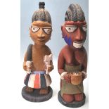 A PAIR OF VINTAGE 20TH CENTURY YORUBA CARVED WOODEN FIGURINES