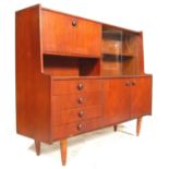 A RETRO MID 20TH CENTURY TEAK WOOD HIGH SIDEBOARD