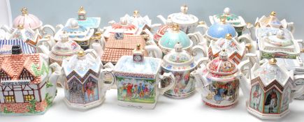 LARGE COLLECTION OF SADLER COMMEMORATIVEWARE TEAPOTS