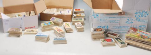 A LARGE QUANTITY OF CIGARETTE CARDS AND TEA CARDS, OVER 4400