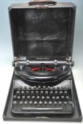 A RETRO 20TH CENTURY REMINGTON NOISELESS PORTABLE TYPEWRITER