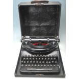 A RETRO 20TH CENTURY REMINGTON NOISELESS PORTABLE TYPEWRITER