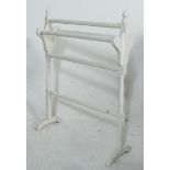 A 19TH CENTURY VICTORIAN MAHOGANY PAINTED WHITE TOWEL RAIL