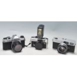 THREE VINTAGE 20TH CENTURY CAMERAS - CANON - PENTAX ASAHI - RICOH