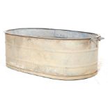 A RETRO 20TH CENTURY RECLAMATION YARD GALVANISED BATH