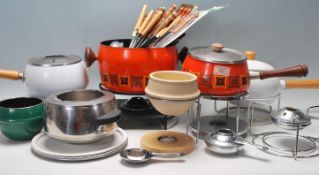 SIX RETRO ENAMELLED FONDUE SETS AND FORKS