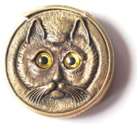 A BRASS CAT VESTA CASE WITH A HINGED LID AND MATCH STRIKE.