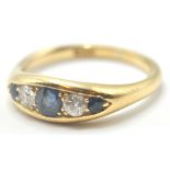 18CT GOLD RING SET WITH SAPPHIRES AND DIAMONDS