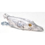 A SILVER PLATES PAPER CLIP / ORGANIZER IN THE FORM OF A FISH.