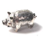 A STAMPED STERLING SILVER FIGURE OF A PIG