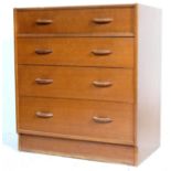 A MID CENTURY OAK G-PLAN SECRETAIRE CHEST OF DRAWERS