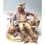 CAPODIMONTE PORCELIAN FIGURINE OF A TRAMP ON BENCH
