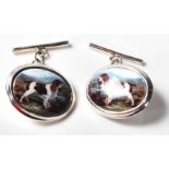 A PAIR OF STAMPED SILVER CUFFLINKS FEATURING SPANIELS.