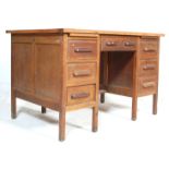 1920'S INDUSTRIAL TWIN PEDESTAL OAK CRUSADER DESK