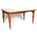 ANTIQUE MAHOGANY EXTENDABLE DINING TABLE