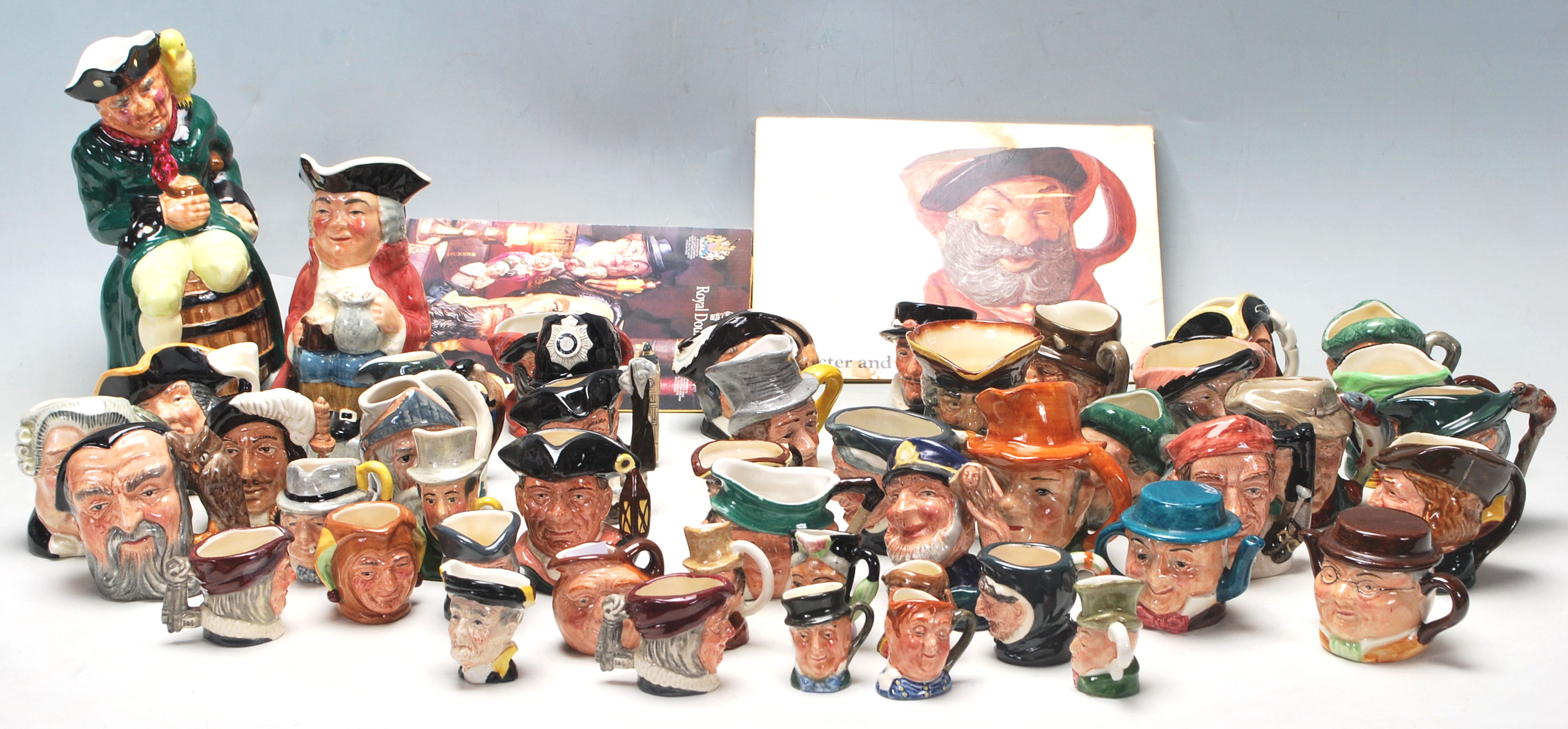 A LARGE COLLECTION OF ROYAL DOULTON MINATURE TOBY JUBS IN MANY CHARACTERS.